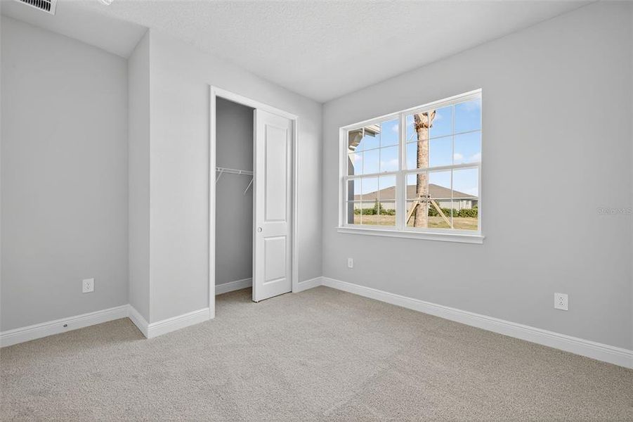 Spacious, unfurnished interior of a new home in Windwater, Parrish (Image 26).