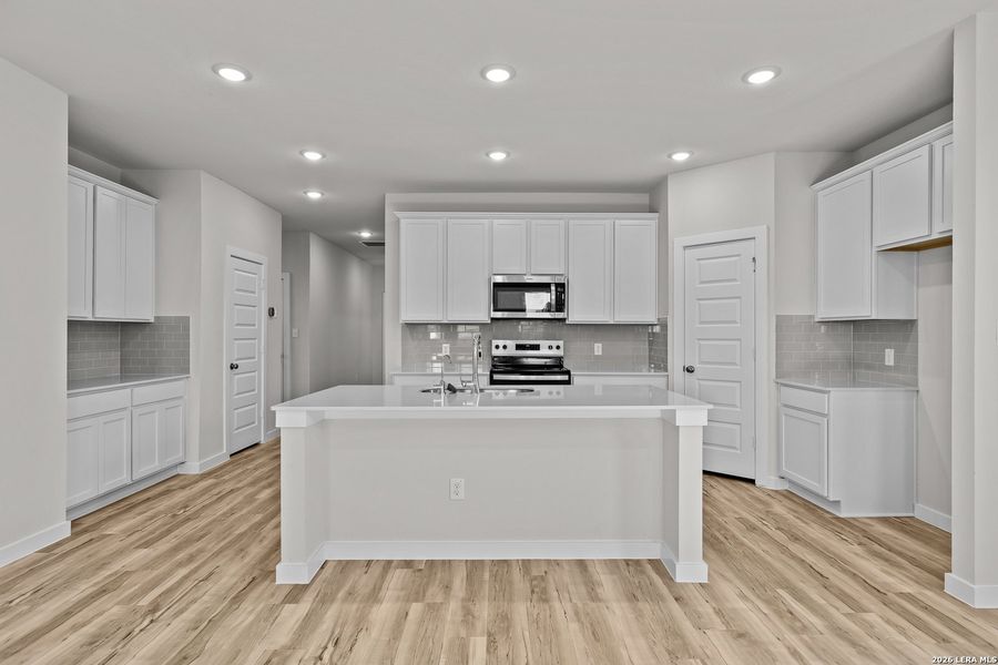 Furnished interior view inside a new home in Cinco Lakes, San Antonio (Image 8).