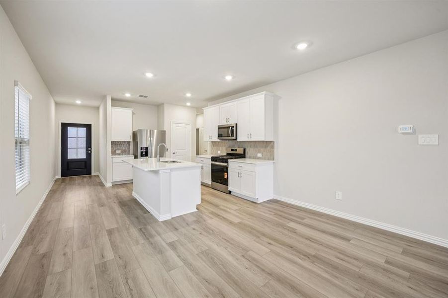 Furnished interior view inside a new home in Parks at Foster Crossing - Spring Series, Anna (Image 13).