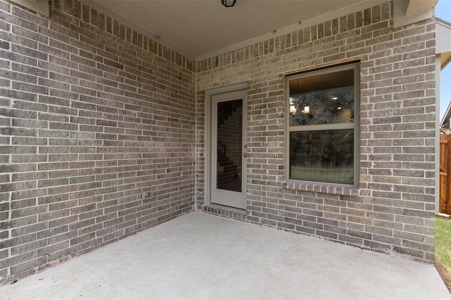 Exterior details and patio area of a home in Mercer Meadows, Royse City (Image 4).