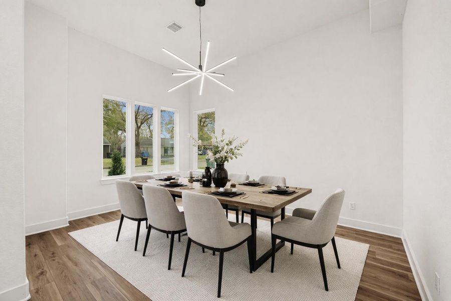 Virtually staged: Formal dinning features stunning modern lighting Virtually staged: Formal dinning features stunning modern lighting