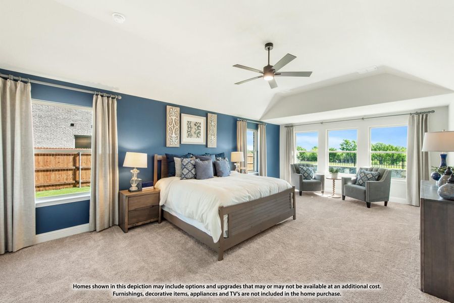 Spacious master bedroom with vaulted ceiling, blue accent wall, ceiling fan, and large windows with backyard views. Spacious master bedroom with vaulted ceiling, blue accent wall, ceiling fan, and large windows with backyard views.