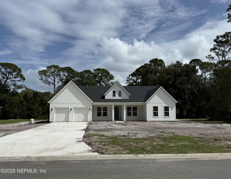Front exterior of a new home in , Palatka, FL, highlighting curb appeal (Image 1).