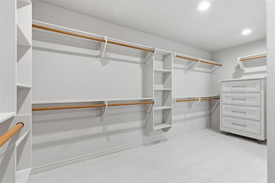 Primary closet with built in dresser Primary closet with built in dresser