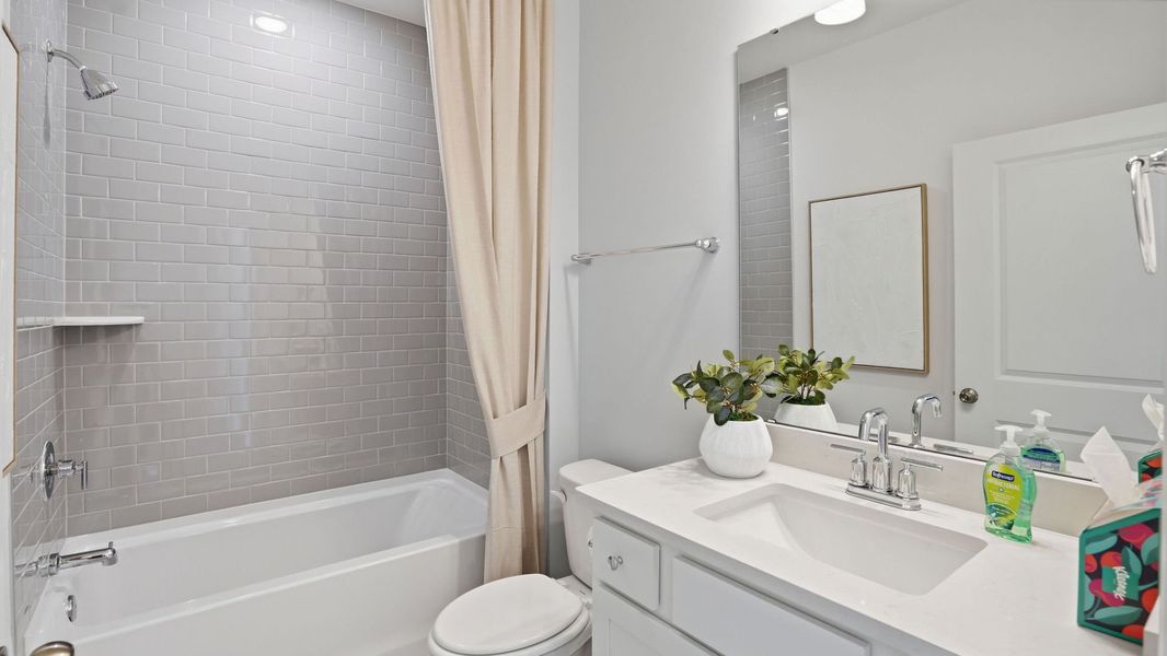 Representative furnished interior of a home built from the Compass by Del Webb in Del Webb Point Hope, Charleston (Image 23).