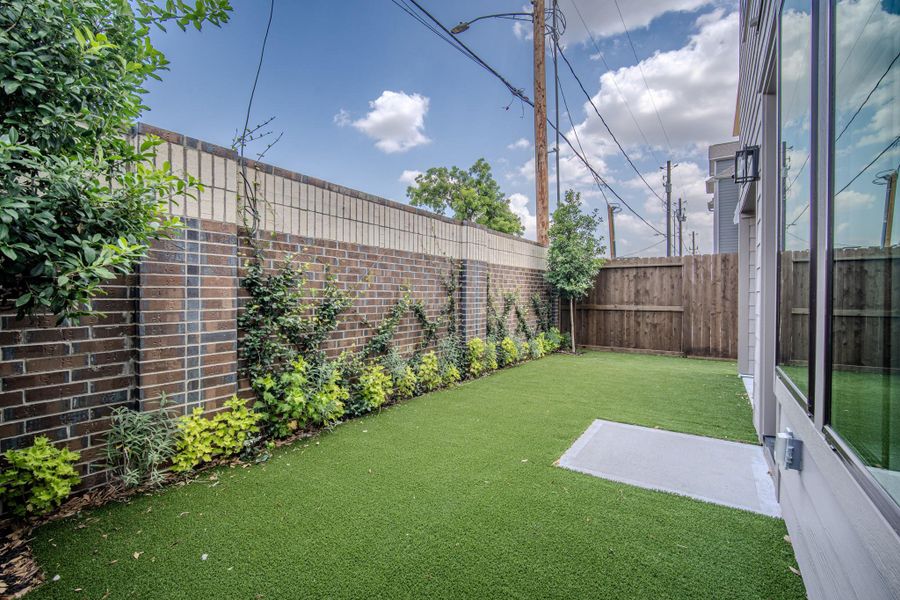 Exterior details and patio area of a home in Spring Valley Creek, Houston (Image 3).