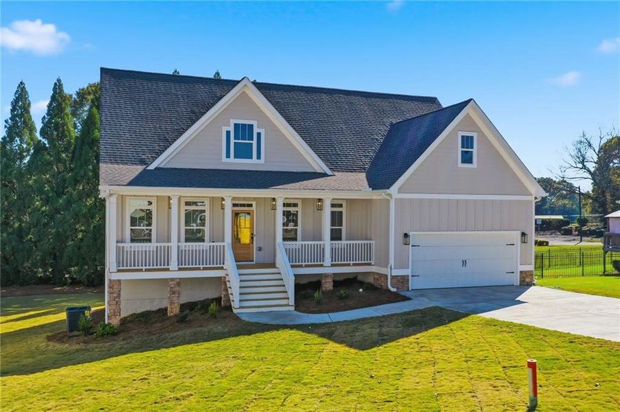 Front exterior of a new home in , Calhoun, GA, highlighting curb appeal (Image 2).