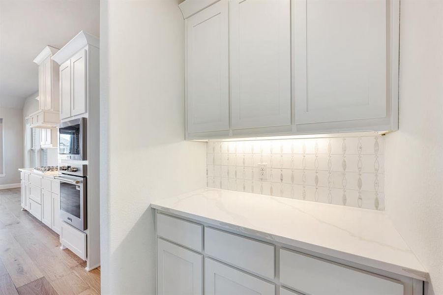 Furnished interior view inside a new home in Parks at Panchasarp Farms 55-60, Burleson (Image 12).