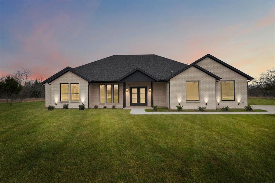 Front exterior of a new home in , Corsicana, TX, highlighting curb appeal (Image 22).