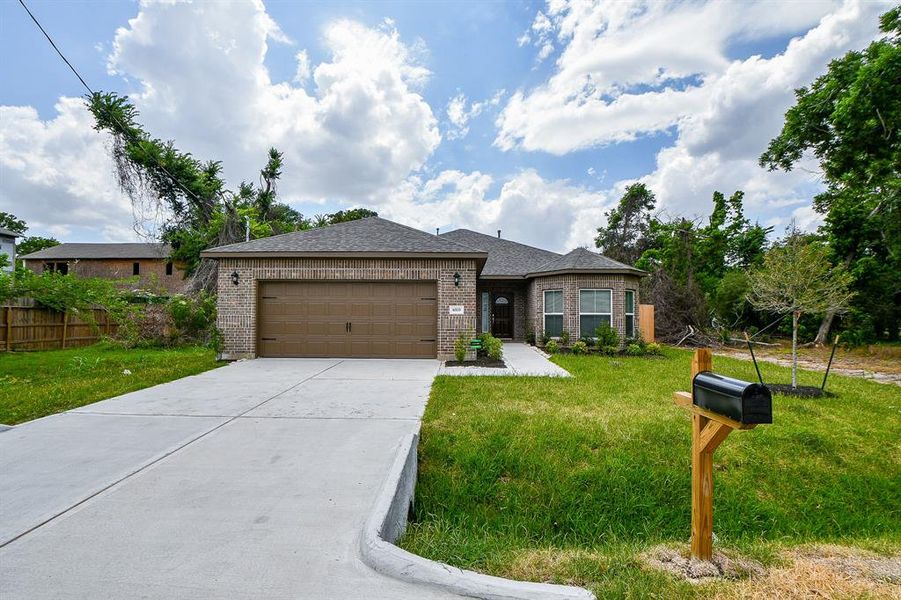 Front exterior of a new home in , Houston, TX, highlighting curb appeal (Image 18).