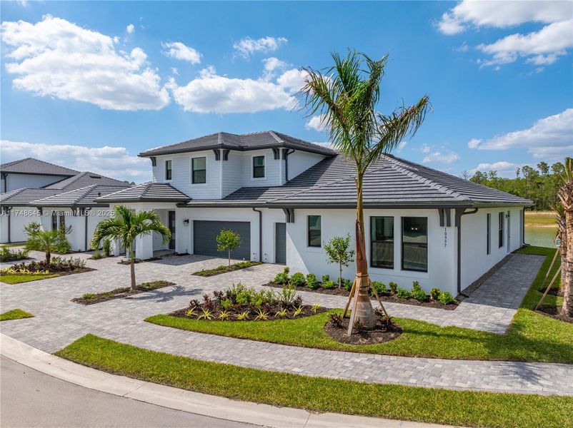 Front exterior of a new home in , Fort Myers, FL, highlighting curb appeal (Image 11).