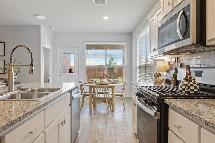 Kitchen has recessed lighting as well as great natural lighting coming from your dining area Kitchen has recessed lighting as well as great natural lighting coming from your dining area