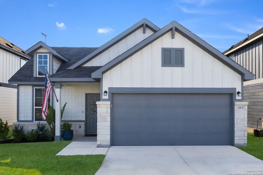 Front exterior of a new home in Davis Ranch, San Antonio, TX, highlighting curb appeal (Image 19).