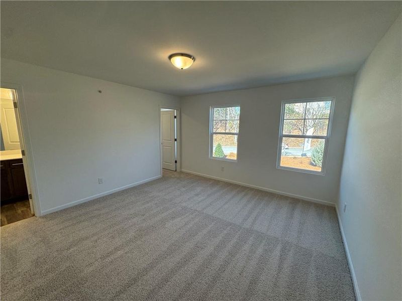 Spacious, unfurnished interior of a new home in Laurelwood, Douglasville (Image 24).