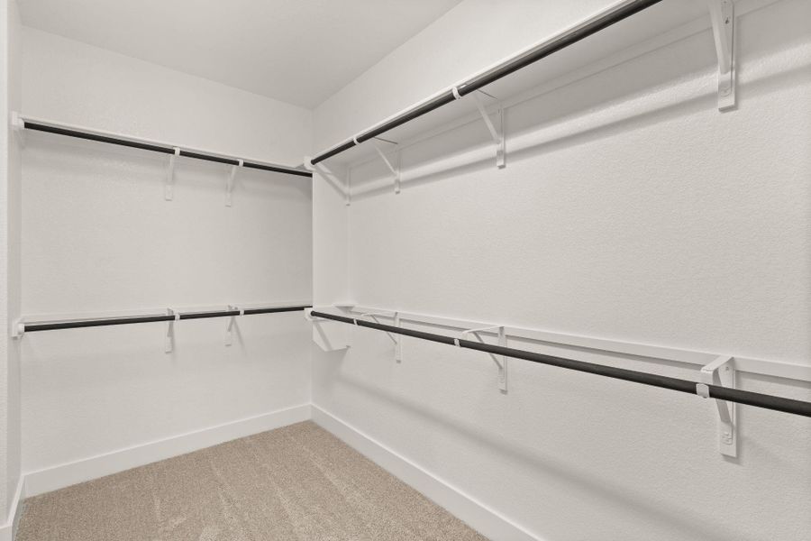 Walk-in closet in Primary Bedroom - Representative Photo