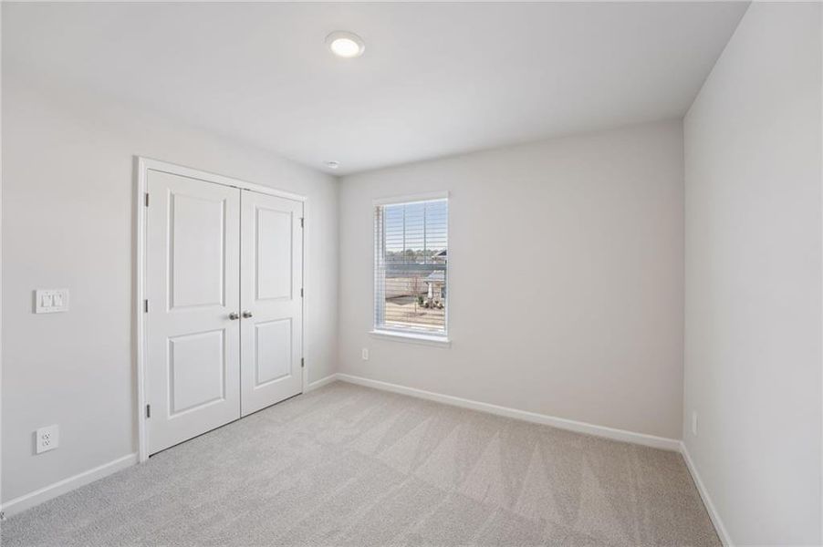 Spacious, unfurnished interior of a new home in Creekside at Oxford Park, Fairburn (Image 37).