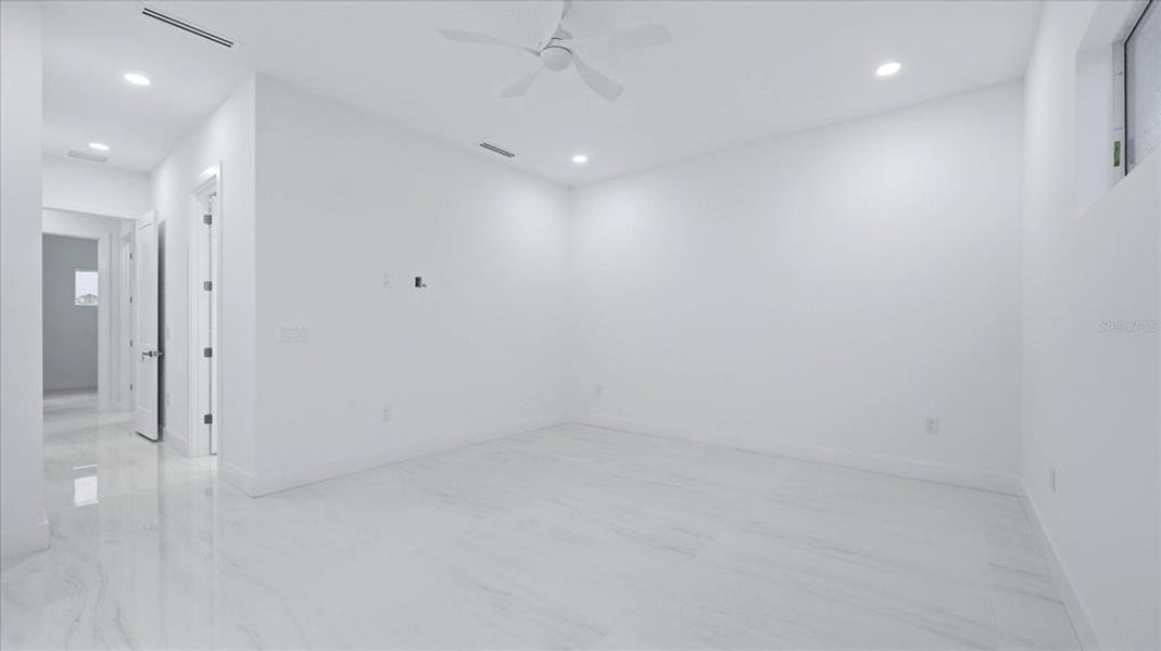 Spacious, unfurnished interior of a new home in , Port Charlotte (Image 31).