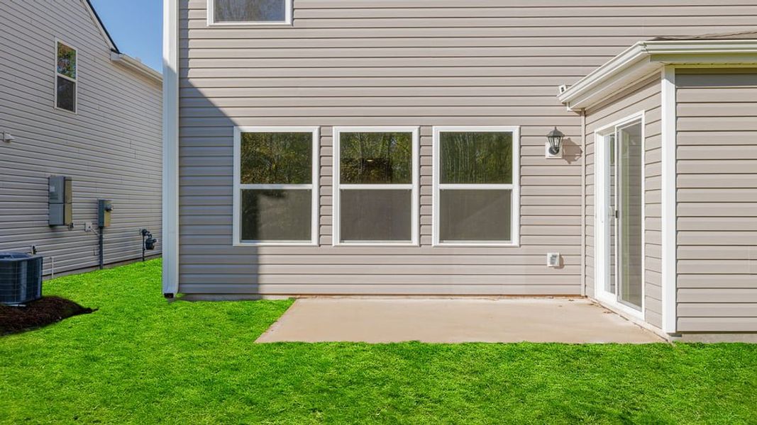 Exterior details and patio area of a home in Durbin Meadows, Fountain Inn (Image 19).