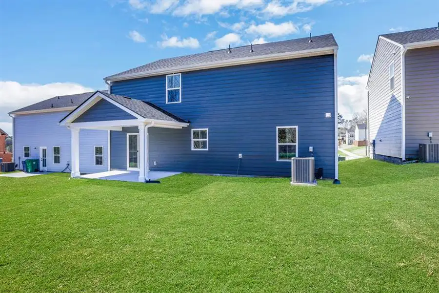 Exterior details and patio area of a home in Summertree, Stone Mountain (Image 2).