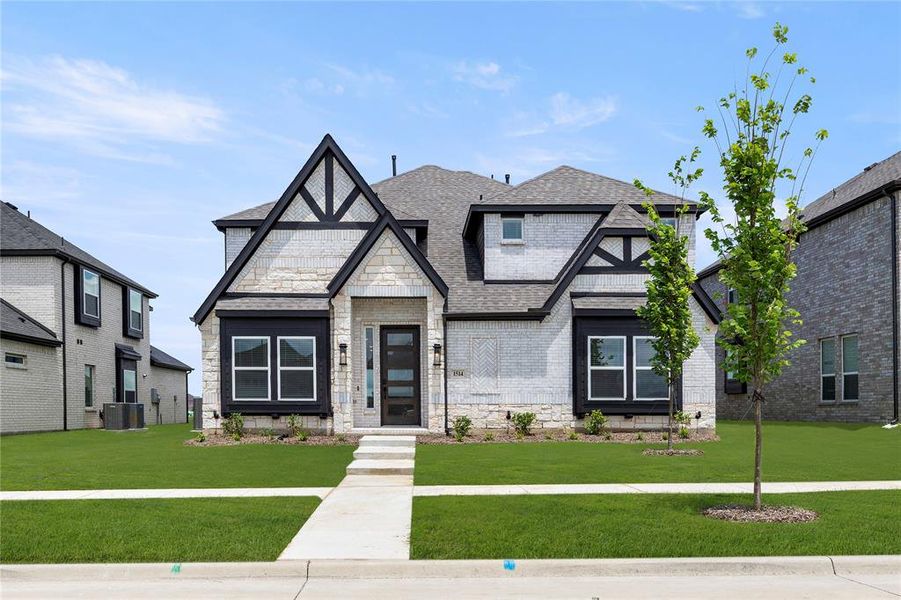 Front exterior of a new home in Villages of Creekwood, Frisco, TX, highlighting curb appeal (Image 1). Front exterior of a new home in Villages of Creekwood, Frisco, TX, highlighting curb appeal (Image 1).