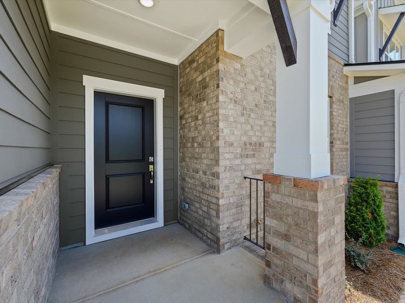 Exterior details and patio area of a home in Hardy Pond Townhomes, Rock Hill (Image 4). Exterior details and patio area of a home in Hardy Pond Townhomes, Rock Hill (Image 4).