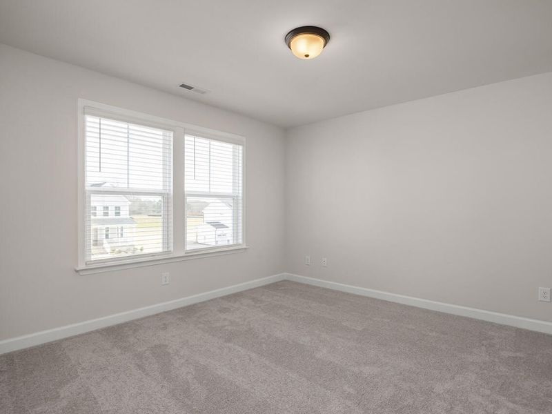 Spacious, unfurnished interior of a new home in Tobacco Road, Angier (Image 25).