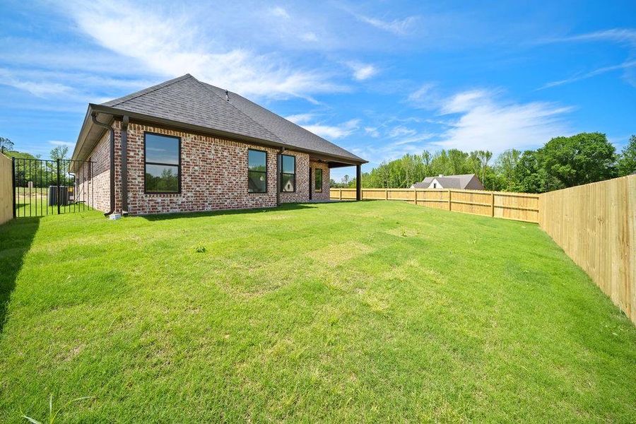 Exterior details and patio area of a home in , Tyler (Image 22).