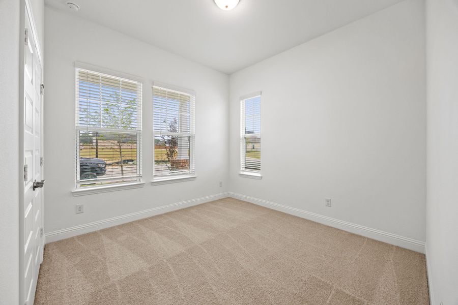 Representative unfurnished interior of a home built from the Kelly by Cambridge Homes in Lake Park, Rowlett (Image 19).