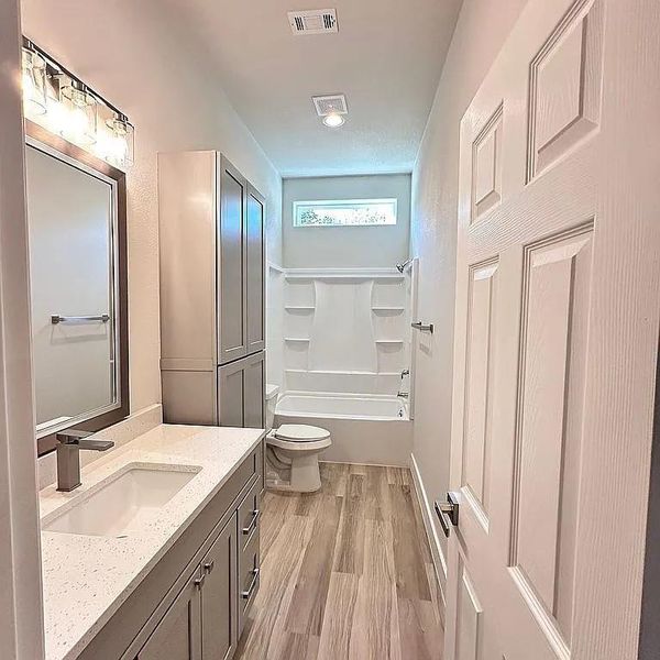 Furnished interior view inside a new home in , Tow (Image 16). Furnished interior view inside a new home in , Tow (Image 16).