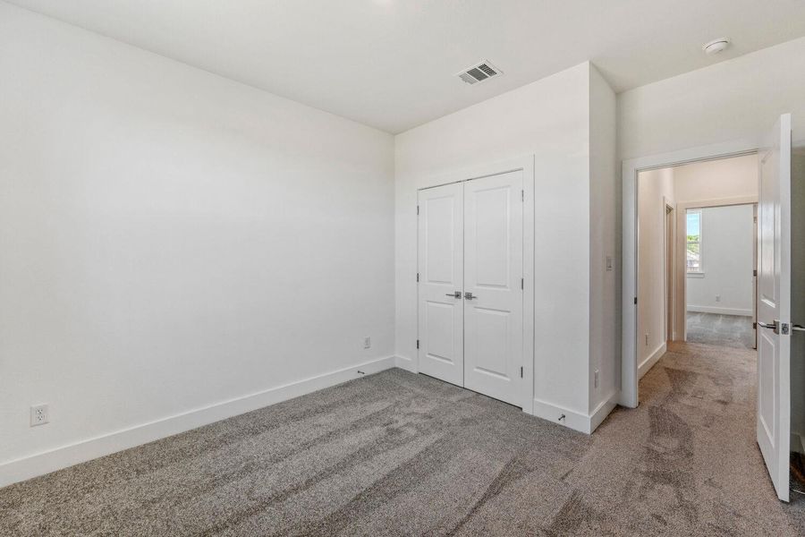 Spacious, unfurnished interior of a new home in Freedom at Anthem, Kyle (Image 22).