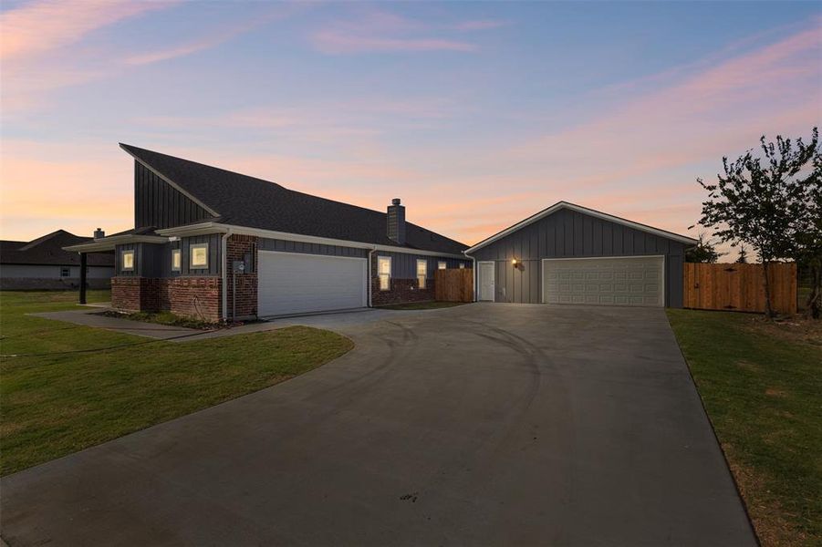 View of front of house featuring brick siding,and 7 car garage