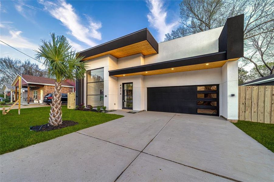 Front exterior of a new home in , Dallas, TX, highlighting curb appeal (Image 19).