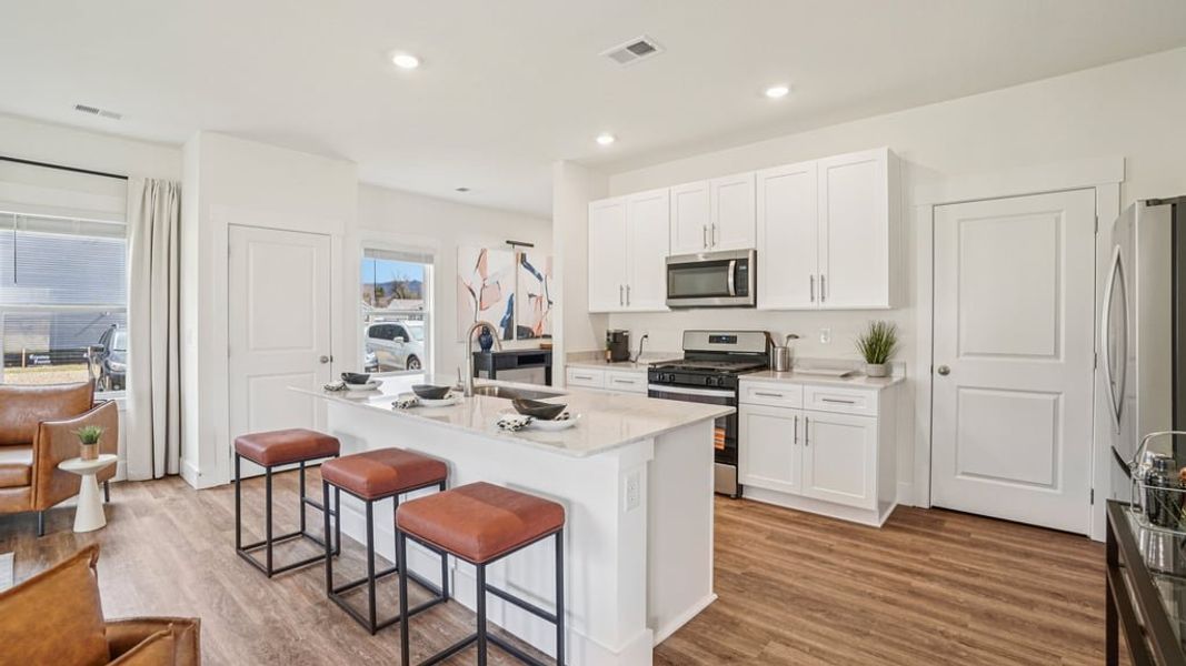Furnished interior view inside a new home in The Hideaway at Fox Meadows, Bluff City (Image 9).