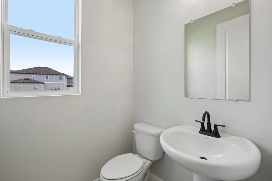 Half bathroom located on the first floor