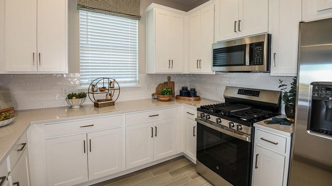 Furnished interior view inside a new home in Esplanade at McKinnon Groves, Winter Garden (Image 3).
