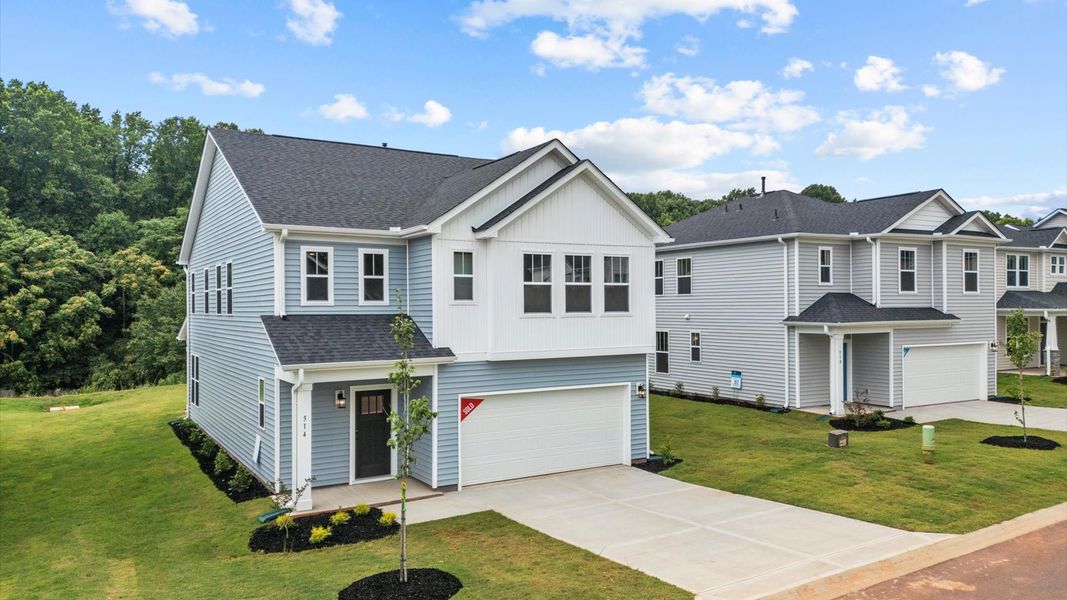 Front exterior of a new home in Spring Branch, Smyrna, TN, highlighting curb appeal (Image 21).