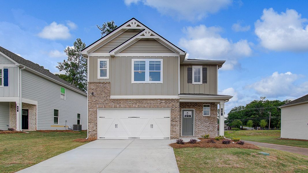Representative exterior photo of a completed home built from the Millhaven by DRB Homes in Enclave at Evergreen, Fairburn, GA (Image 19).