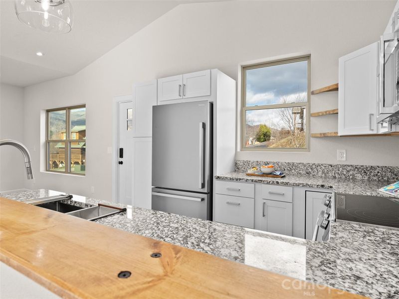 Furnished interior view inside a new home in , Waynesville (Image 5).