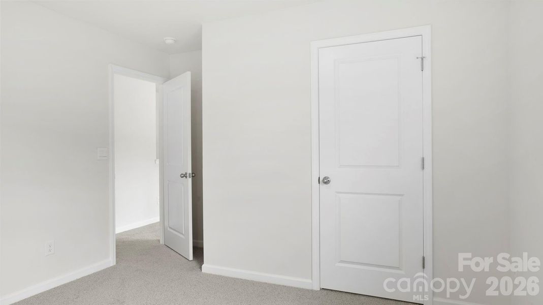 Spacious, unfurnished interior of a new home in Wildbrook Village, Waynesville (Image 24). Spacious, unfurnished interior of a new home in Wildbrook Village, Waynesville (Image 24).