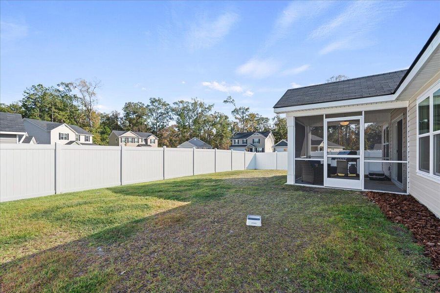 Exterior details and patio area of a home in , Bluffton (Image 3).