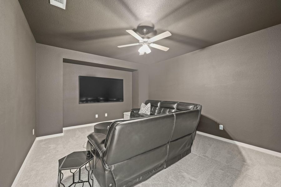 Dim the lights, grab the popcorn and settle in to watch your favorite movies or TV shows in the home theater just off the game room. The perfect room to Netflix and chill!