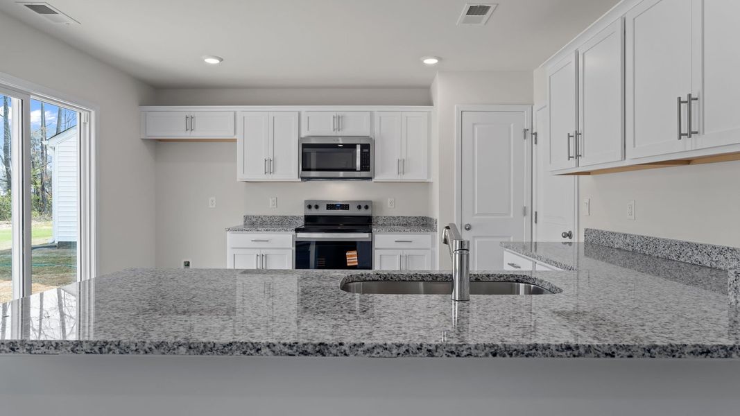 Furnished interior view inside a new home in Jetstream Park, Wilson (Image 5).