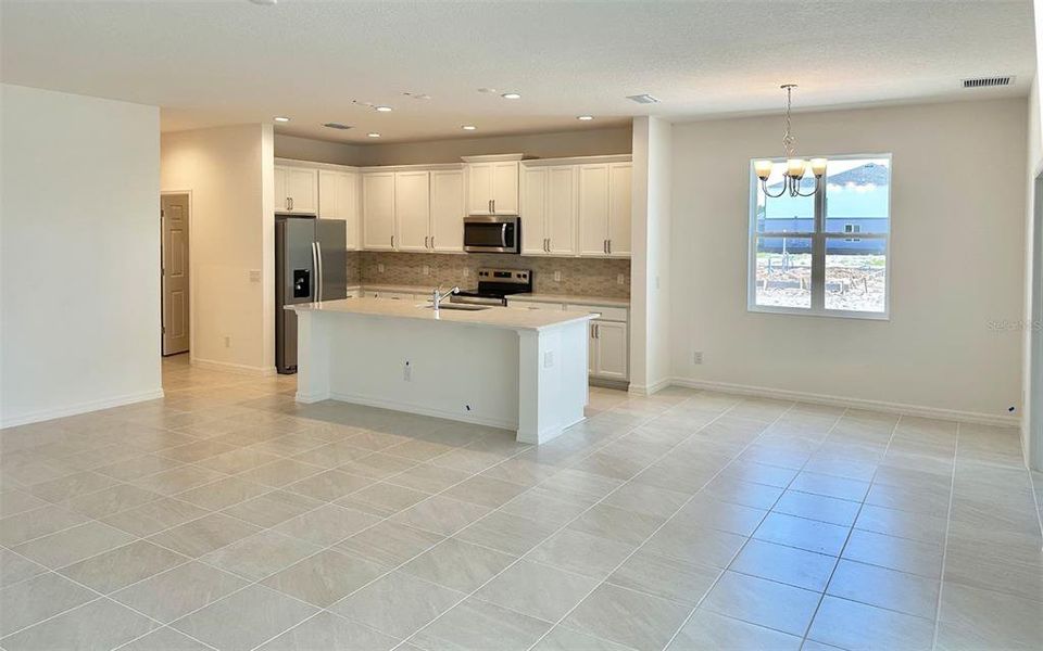 Furnished interior view inside a new home in Trinity Place, St. Cloud (Image 4).