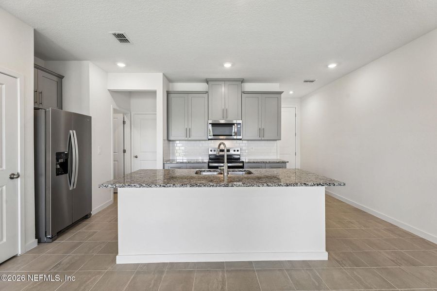 Furnished interior view inside a new home in Parkside at Shearwater, St. Augustine (Image 11).