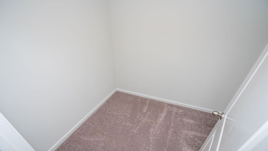 Representative unfurnished interior of a home built from the ARIA by D.R. Horton in The Meadows at Wildwood Village, Shallotte (Image 29). Representative unfurnished interior of a home built from the ARIA by D.R. Horton in The Meadows at Wildwood Village, Shallotte (Image 29).