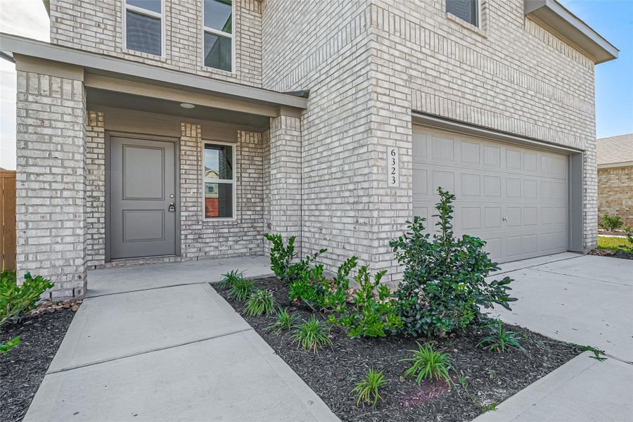 Front exterior of a new home in , Katy, TX, highlighting curb appeal (Image 19). Front exterior of a new home in , Katy, TX, highlighting curb appeal (Image 19).