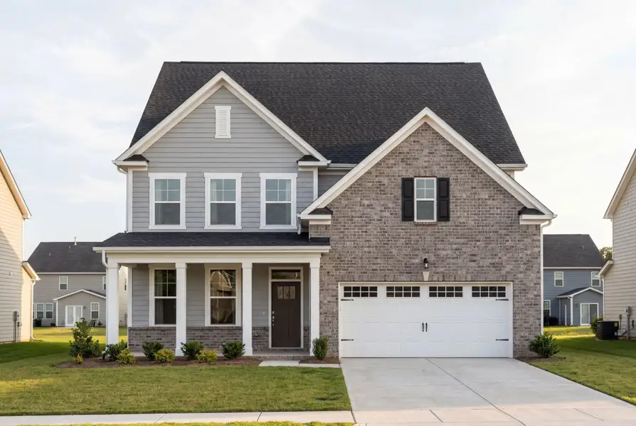 Representative exterior photo of a completed home built from the The Hickory II C by Davidson Homes LLC in Sage on North Main, Wake Forest, NC (Image 1). Representative exterior photo of a completed home built from the The Hickory II C by Davidson Homes LLC in Sage on North Main, Wake Forest, NC (Image 1).