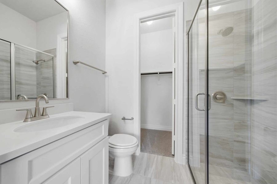 Furnished interior view inside a new home in The Woodlands Hills 65′, Willis (Image 29).