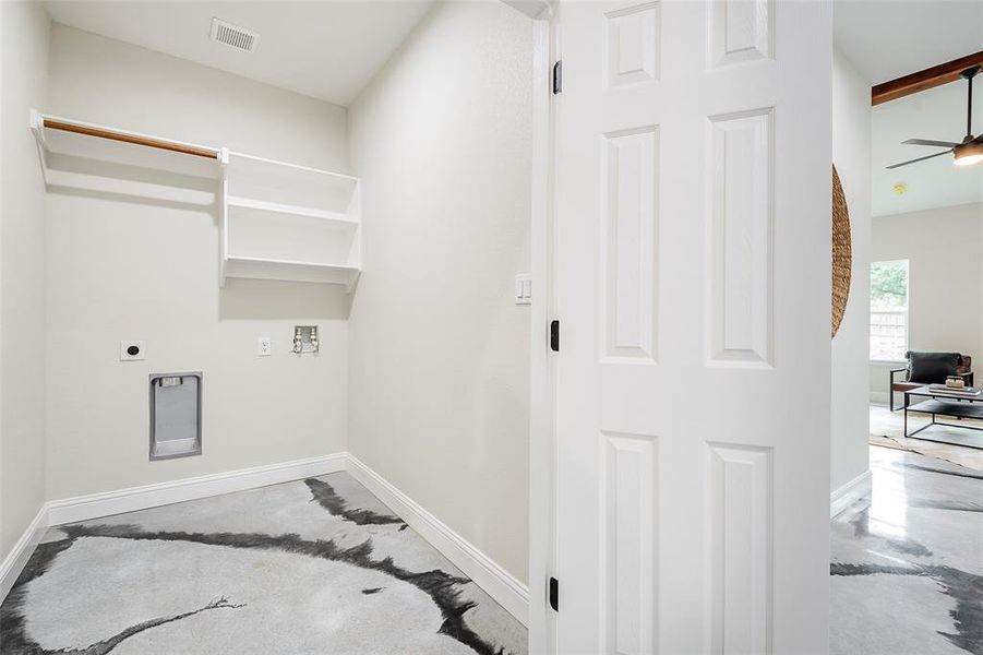 Clothes washing area featuring electric dryer hookup and ceiling fan