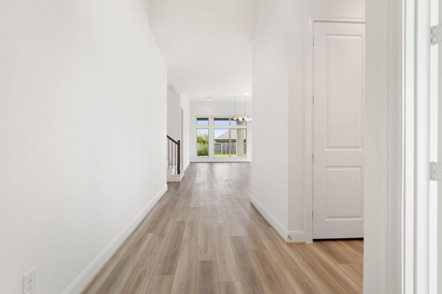 The long entryway gives a feeling of grandness as you step inside the home.